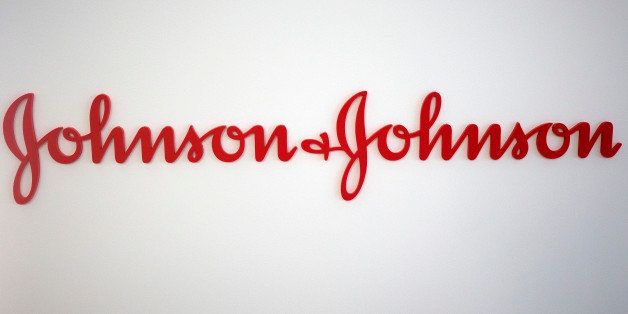 A logo sits on a wall inside Johnson & Johnson's innovation centre in London, U.K., on Thursday, July 18, 2013. Second-quarter sales rose 8.5 percent to $17.9 billion, helped by demand for the company's newer pharmaceutical offerings including the blood thinner Xarelto and the prostate cancer medicine Zytiga. Photographer: Simon Dawson/Bloomberg via Getty Images