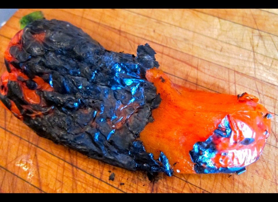 A Juicy, Aromatic Sweet Pepper, Charred And Partially Peeled