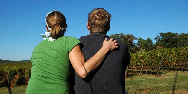 Young couple sitting together.