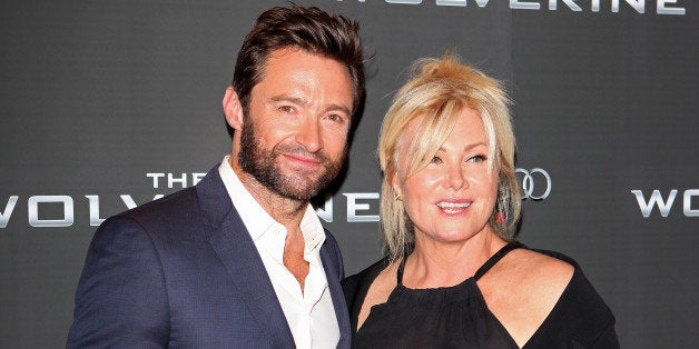 LONDON, ENGLAND - JULY 16: (EMBARGOED FOR PUBLICATION IN UK TABLOID NEWSPAPERS UNTIL 48 HOURS AFTER CREATE DATE AND TIME. MANDATORY CREDIT PHOTO BY DAVE M. BENETT/WIREIMAGE REQUIRED) Hugh Jackman (L) and wife Deborra-Lee Furness attend the UK Premiere of 'The Wolverine' at Empire Leicester Square on July 16, 2013 in London, England. (Photo by Dave M. Benett/WireImage)