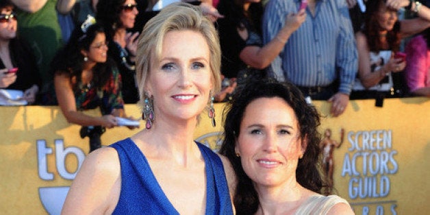 LOS ANGELES, CA - JANUARY 29: Actress Jane Lynch (L) and Dr. Lara Embry arrive at the 18th Annual Screen Actors Guild Awards at The Shrine Auditorium on January 29, 2012 in Los Angeles, California. (Photo by Jeff Kravitz/FilmMagic)