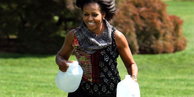US First Lady Michelle Obama runs on the South Lawn of the White House in Washington during an event announcing the creation of a program to promote military family wellness on May 9, 2011. AFP PHOTO/Chris KLEPONIS (Photo credit should read CHRIS KLEPONIS/AFP/Getty Images)