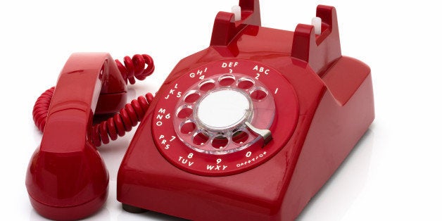 a red retro telephone isolated...