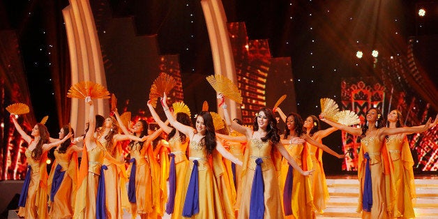 NUSA DUA, INDONESIA - SEPTEMBER 08: Miss World contestants perform during the Miss World 2013 Indonesia opening show on September 8, 2013 in Nusa Dua, Indonesia. Indonesia's government has moved the final round of the Miss World pageant from main Java island to the resort island of Bali due to the ongoing Muslim protests. (Photo by Ed Wray/Getty Images)