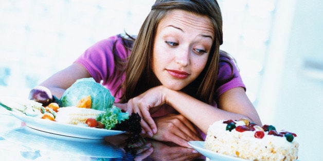 Woman tempted by cake