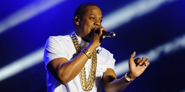 LONDON, UNITED KINGDOM - JULY 13: Jay-Z performs on day 2 of the Yahoo! Wireless Festival at Queen Elizabeth Olympic Park on July 13, 2013 in London, England. (Photo by Joseph Okpako/Getty Images)