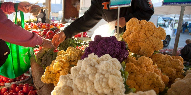 Fresh produce sits on display for sale at the Minneapolis Farmers Market in Minneapolis, Minnesota, U.S., on Saturday, Sept. 21, 2013. The House passed a measure last week that would cut $39 billion from nutrition programs over a decade. Under the bill, food-stamp benefits would be stopped next year for an estimated 3.8 million Americans, according to the Congressional Budget Office. Photographer: Ariana Lindquist/Bloomberg via Getty Images