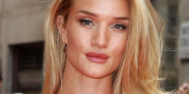 LONDON, UNITED KINGDOM - JUNE 17: Rosie Huntington-Whiteley attends the UK Premiere of 'Hummingbird' at Odeon West End on June 17, 2013 in London, England. (Photo by Fred Duval/Getty Images)