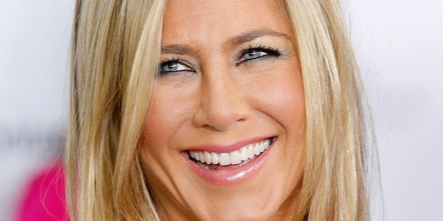 TORONTO, ON - SEPTEMBER 14: Actress Jennifer Aniston attends the introduction at the premiere for 'Life Of Crime' at Roy Tho