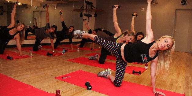 NEW YORK, NY - SEPTEMBER 20: Celebrity fitness expert Tracy Anderson trains with POM Coconut and invited guests during a private workout at Le Parker Meridien on September 20, 2013 in New York City. (Photo by Donald Bowers/Getty Images for POM)