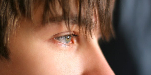 sad teenager face with focus on ...