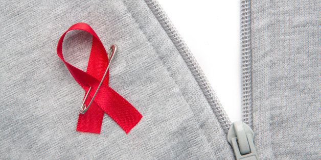 aids awareness ribbon pinned on ...