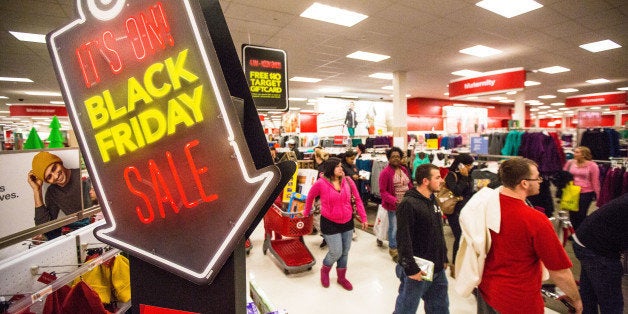 BRAINTREE, MA - NOVEMBER 23: Shoppers hurried through the aisles in Target during Black Friday at South Shore Plaza in Braintree. (Photo by Aram Boghosian for The Boston Globe via Getty Images)