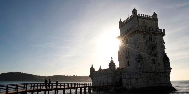 LISBON, PORTUGAL - DECEMBER 23: Belem Tower is seen on December 23, 2013 in Lisbon, Portugal. The tower is a fortified tower located in the civil parish of Santa Maria de Belem in the municipality of Lisbon, Portugal. It is a UNESCO World Heritage Site (along with the nearby Jerￃﾳnimos Monastery) because of the significant role it played in the Portuguese maritime discoveries of the era of the Age of Discoveries. (Photo by Pedro Loureiro/Getty Images)