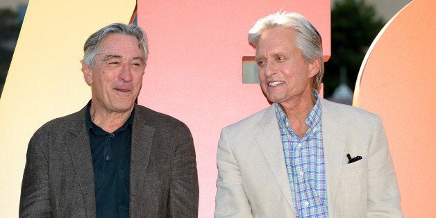 LAS VEGAS, NV - OCTOBER 18: Cast members from CBS Films' 'Last Vegas' Robert De Niro (L) and Michael Douglas talk in front of the Bellagio during the presentation to the cast of a ceremonial key to the city of Las Vegas on October 18, 2013 in Las Vegas, Nevada. The movie opens nationwide in the United States on November 1. (Photo by Ethan Miller/Getty Images)