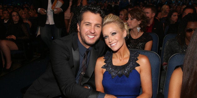 LOS ANGELES, CA - NOVEMBER 18: Singer Luke Bryan (L) and wife Caroline at the 40th American Music Awards held at Nokia Theatre L.A. Live on November 18, 2012 in Los Angeles, California. (Photo by Christopher Polk/AMA2012/Getty Images for AMA)