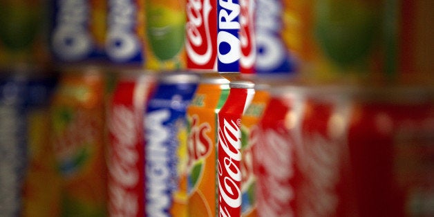 A picture taken on September 8, 2011 in Paris shows cans of various sodas. After the French government announced on August 24 to tax these products as part of its austerity plan to reduce the national debt, professionals of the industry contested the measure, last of which the US giant Coca-Cola who suspended a 17 million euro (23.780 million US dollars) investment in France. French President Nicolas Sarkozy insisted on September 7 he was determined to push through a balanced budget amendment called 'golden rule' despite reports that he might drop the contested plan. AFP PHOTO JOEL SAGET (Photo credit should read JOEL SAGET/AFP/Getty Images)