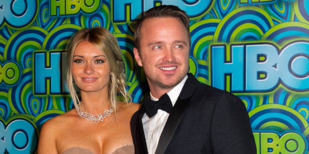 LOS ANGELES, CA - SEPTEMBER 22: Actor Aaron Paul (R) and Lauren Parsekian arrive at HBO's Annual Primetime Emmy Awards Post Award Reception at The Plaza at the Pacific Design Center on September 22, 2013 in Los Angeles, California. (Photo by Rodrigo Vaz/FilmMagic)