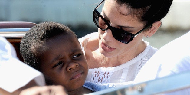 VENICE, ITALY - AUGUST 27: Actress Sandra Bullock (R) and son Louis Bardo Bullock is seen during the 70th Venice International Film Festival on August 27, 2013 in Venice, Italy. (Photo by Jacopo Raule/FilmMagic)