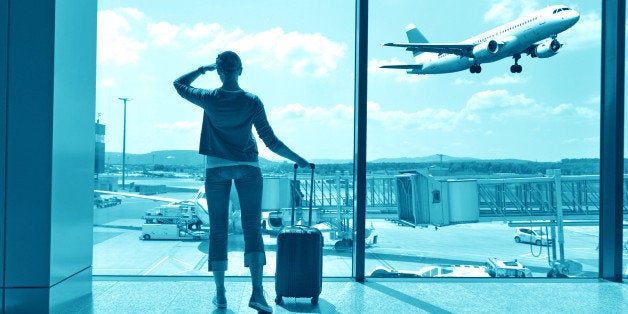 girl at the airport window