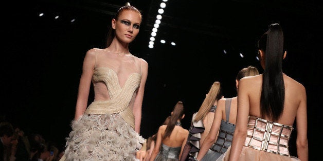 ROME, ITALY - JANUARY 27: Models walk the runway during Raffaella Frasca S/S 2014 Italian Haute Couture colletion fashion show as part of AltaRoma AltaModa Fashion Week at Santo Spirito In Sassia on January 26, 2014 in Rome, Italy. (Photo by Elisabetta Villa/Getty Images)