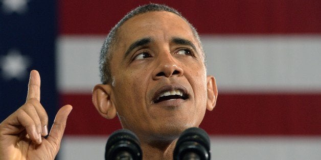 US President Barack Obama speaks at the Costco in Lanham, Maryland, on January 29, 2014 to highlight the importance of raising the federal minimum wage for all Americans. Obama vowed to reverse a tide of economic inequality threatening the American dream Tuesday, seeking to outflank Republicans and revive a second term blighted by self-inflicted wounds and partisan warfare. In his annual State of the Union address, Obama promised to wield his executive powers in a 'year of action' to lift up workers, improve education and clean the environment if his foes in Congress balk at more sweeping action. AFP PHOTO/Jewel Samad (Photo credit should read JEWEL SAMAD/AFP/Getty Images)