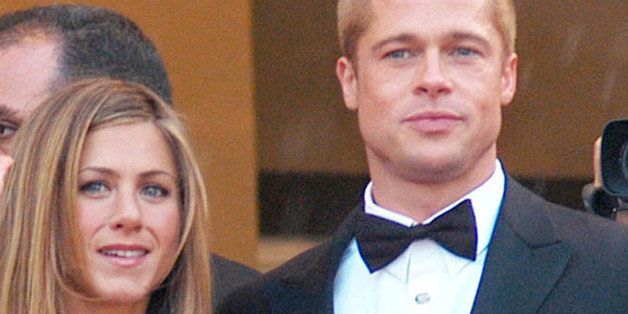 Jennifer Aniston and Brad Pitt during 2004 Cannes Film Festival - 'Troy' Premiere at Palais Du Festival in Cannes, France. (Photo by Christian Alminana/FilmMagic)