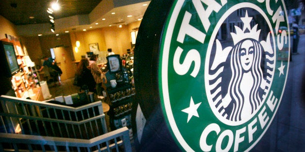 A Starbucks coffee shop begins to slow down early Tuesday evening just before closing it's doors early, Feb. 26, 2008, in Seattle. Starbucks, the world's largest gourmet coffee retailer, shut its doors for three-hour nationwide training sessions Tuesday evening. (AP Photo/Elaine Thompson)