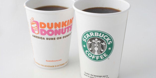 WASHINGTON, DC - SEPTEMBER 06: Dunkin' Donuts and Starbucks coffee cups. Photographed in the Washington Post Studio on September 6, 2006, in Washington, DC. (Photo by Julia Ewan/The Washington Post via Getty Images)