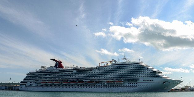 Carnival Corp. & Plc's Breeze cruise ship stands docked prior to departure at the Port of Miami in Miami, Florida, U.S. on Sunday, March 9, 2014. Carnival Breeze was built by Italian shipbuilder Fincantieri SpA. Photographer: Christina Mendenhall/Bloomberg via Getty Images