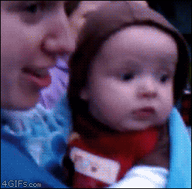 This kid is seeing fireworks for the very first time...