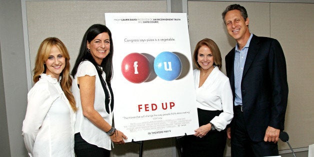 NEW YORK, NY - MAY 01: Director Stephanie Soechtig, Executive Producer Laurie David, Narrator and Executive Producer Katie Couric and Dr. Mark Hyman attend the 'Fed Up' press conference at Regency Hotel on May 1, 2014 in New York City. (Photo by Steve Mack/FilmMagic)