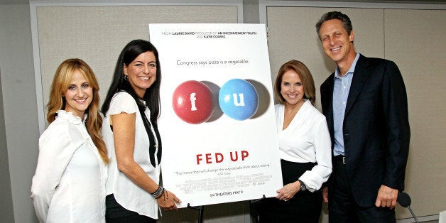 NEW YORK, NY - MAY 01: Director Stephanie Soechtig, Executive Producer Laurie David, Narrator and Executive Producer Katie Couric and Dr. Mark Hyman attend the 'Fed Up' press conference at Regency Hotel on May 1, 2014 in New York City. (Photo by Steve Mack/FilmMagic)