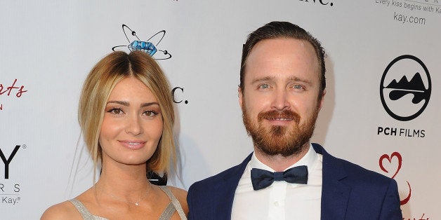 MALIBU, CA - MAY 10: (L-R) Lauren Parsekian-Paul and her husband actor Aaron Paul attend the 'Open Hearts Foundation Gala' on May 10, 2014 in Malibu, California. (Photo by Angela Weiss/Getty Images for Open Hearts Foundation)