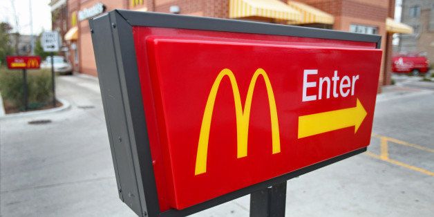 The McDonald's Corp. logo is displayed on a sign outside of a restaurant in Chicago, Illinois, U.S., on Tuesday, Oct. 18, 2011. McDonald's Corp. is scheduled to release quarterly earnings on Oct. 21. Photographer: Tim Boyle/Bloomberg via Getty Images
