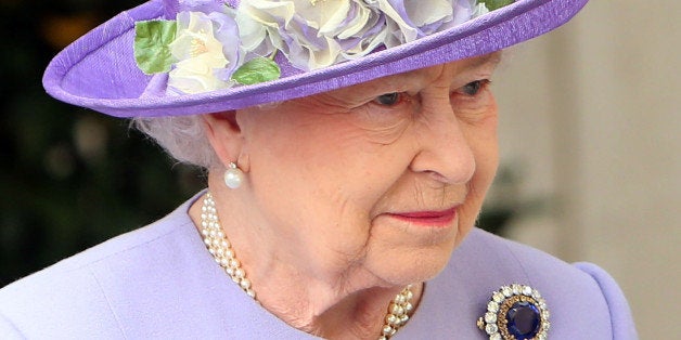 VATICAN CITY, VATICAN - APRIL 03: Queen Elizabeth II leaves the Paul VI Hall after a meeting with Pope Francis on April 3, 2014 in Vatican City, Vatican. During their brief visit The Queen and the Duke of Edinburgh will have lunch with Italian President Giorgio Napolitano and an audience with Pope Francis at the Vatican. The Queen was originally due to travel to Rome in April 2013 but the visit was postponed due to her ill health. The audience with Pope Francis will be the fifth meeting The Queen, who is head of the Church of the England, has held with a Pope in the Vatican. (Photo by Franco Origlia/Getty Images)