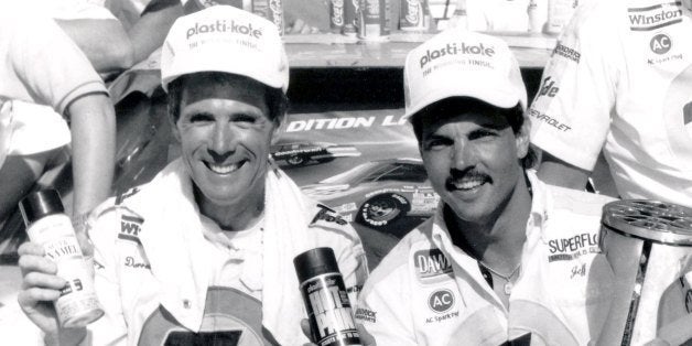CONCORD, NC - MAY 28: Darrell Waltrip and Jeff Hammond celebrate in Victory Lane as they acknowledges his second Plasti-Kote