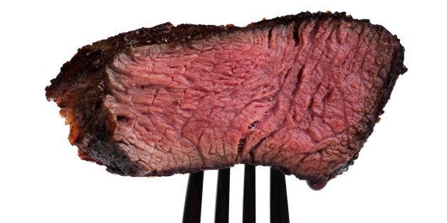 piece of a grilled steak on a...