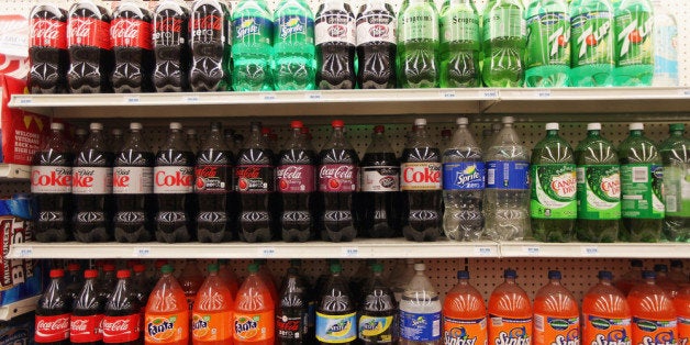 NEW YORK, NY - MAY 31: Two-liter bottles of regular and diet soda are seen for sale at a Manhattan store on May 31, 2012 in New York City. New York City Mayor Michael Bloomberg is proposing a ban on sodas and sugary drinks that are more than 16 ounces in an effort to combat obesity. Diet sodas would not be covered by the ban and many grocery stores would be exempt. (Photo by Mario Tama/Getty Images)