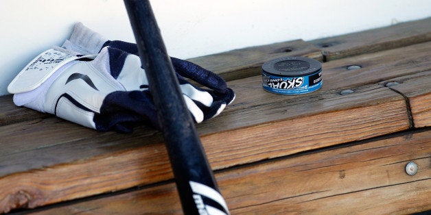 BALTIMORE, MD - APRIL 06: A can of smokeless tobacco sits in the Minnesota Twins dugout before the start of the Twins and Baltimore Orioles opening day game at Oriole Park at Camden Yards on April 6, 2012 in Baltimore, Maryland. (Photo by Rob Carr/Getty Images)