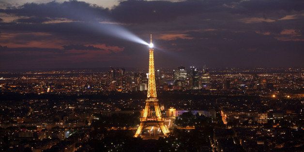 A general view shows the Eiffel Tower at night on July 14, 2012 in Paris. AFP PHOTO / LOIC VENANCE (Photo credit should read LOIC VENANCE/AFP/GettyImages)