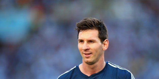 RIO DE JANEIRO, BRAZIL - JULY 13: Lionel Messi of Argentina looks on during the 2014 FIFA World Cup Brazil Final match between Germany and Argentina at Maracana on July 13, 2014 in Rio de Janeiro, Brazil. (Photo by Julian Finney/Getty Images)