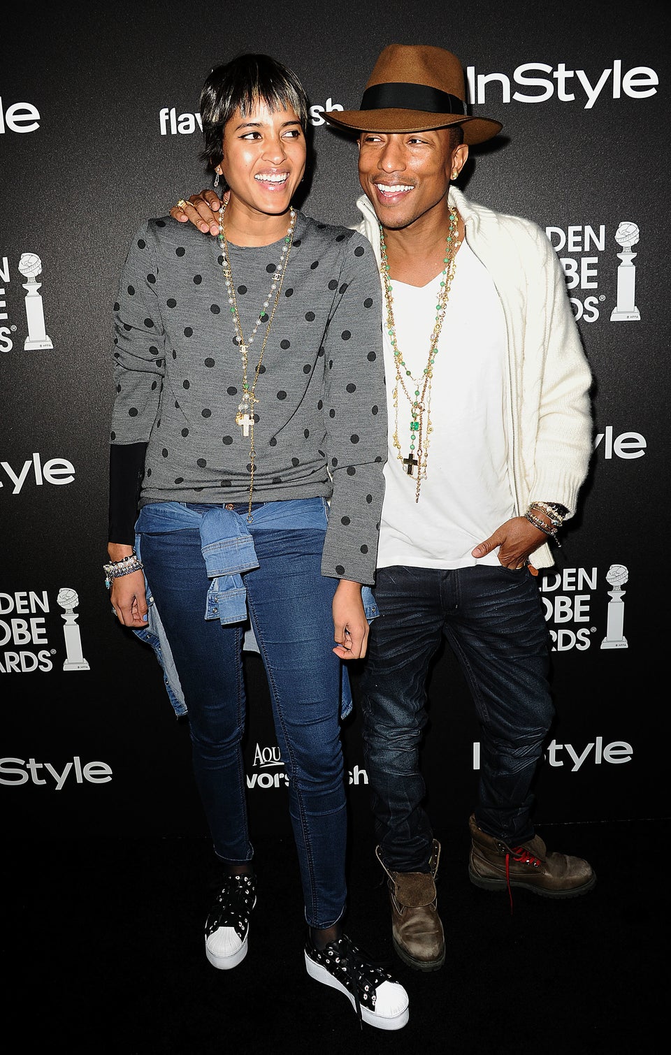 Pharrell Williams and his wife Helen Lasichanh put on a stylish