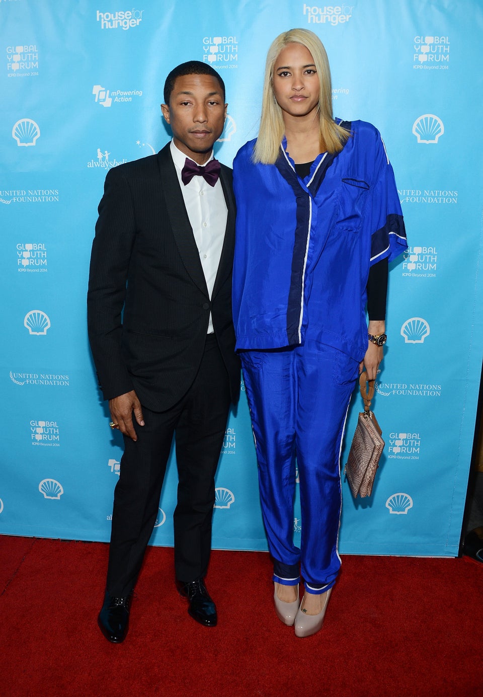 Pharrell Williams and his wife Helen Lasichanh put on a stylish