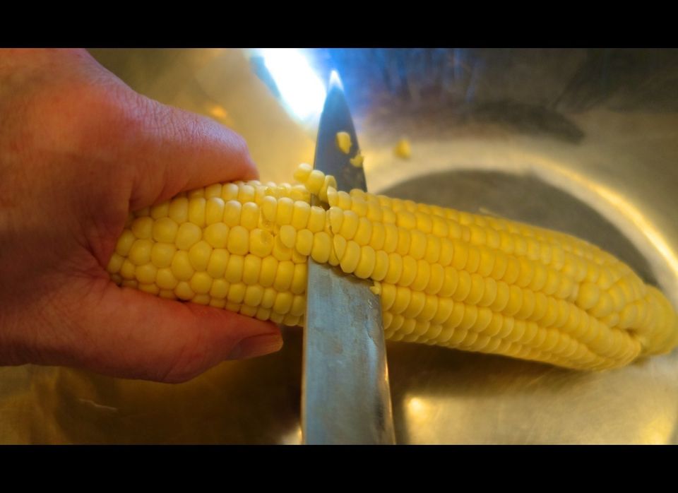 First cut off the kernels, then scrape the "milk" from the cobs