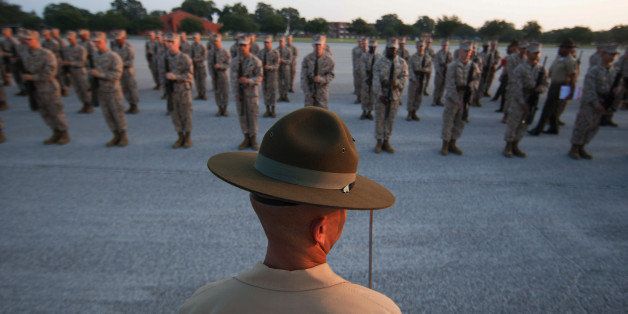 Gunnery Sgt. Julio Mercedes, senior drill instructor of Platoon 1070, Delta Company, 1st Recruit Training Battalion, checks to make sure his recruits are aligned Sept. 4, 2013, during their final drill evaluation at the main parade deck on Parris Island, S.C. Four drillmasters, experts on the Marine Corps Drill and Ceremonies Manual, graded Mercedes, a 36-year-old native of the Bronx, N.Y., on his appearance and ability to command. Delta Company is scheduled to graduate Sept. 13, 2013. Parris Island has been the site of Marine Corps recruit training since Nov. 1, 1915. Today, approximately 20,000 recruits come to Parris Island annually for the chance to become United States Marines by enduring 13 weeks of rigorous, transformative training. Parris Island is home to entry-level enlisted training for 50 percent of males and 100 percent of females in the Marine Corps. (Photo by Lance Cpl. MaryAnn Hill)