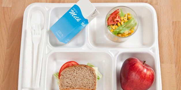 White School lunch tray on white background. Milk Bottle with custom design label.