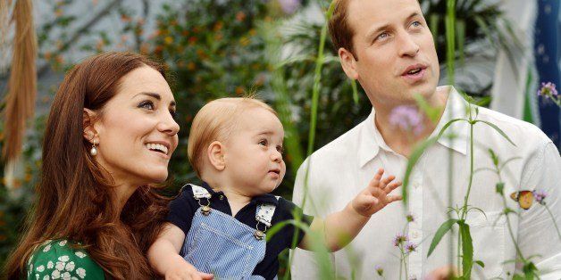 A photograph taken in London on Wednesday July 2, 2014, to mark Britain's Prince George's first birthday, shows Prince William (R) and Catherine, Duchess of Cambridge (L) with Prince George during a visit to the Sensational Butterflies exhibition at the Natural History Museum in London. Britain's Prince William and his wife Catherine on Monday thanked well-wishers around the world as they prepared to celebrate their son Prince George's first birthday. AFP PHOTO/John Stillwell/POOLEDITORIAL USE ONLY (Photo credit should read JOHN STILLWELL/AFP/Getty Images)