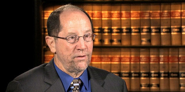 This image from video shows Dr. Dan Lucey of the Georgetown University Medical Center, during an interview with The Associated Press in Washington, Thursday, Sept. 4, 2014, where he discussed the three weeks he spent in Sierra Leone working in a hospital in Freetown and helping other doctors to train local health workers to use personal protective equipment. (AP Photo)