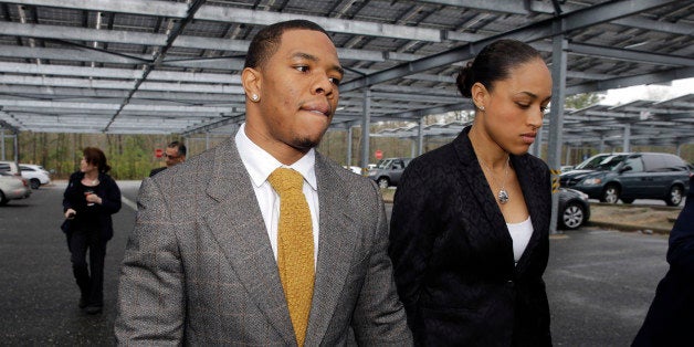 FILE - In this May 1, 2014, file photo, Baltimore Ravens football player Ray Rice holds hands with his wife, Janay Palmer, as they arrive at Atlantic County Criminal Courthouse in Mays Landing, N.J. Banter by two "Fox & Friends" hosts about video showing Rice hitting his then future wife is under fire. The hosts, Brian Kilmeade and Steve Doocey, made their on-air comments Monday, Sept. 8, 2014, while discussing newly released elevator video showing Rice hitting Janay Palmer in February. (AP Photo/Mel Evans, File)